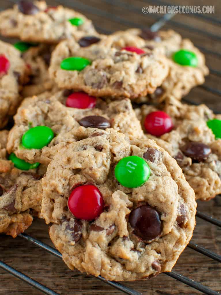 Best Christmas Monster Cookies piled on a cookie rack